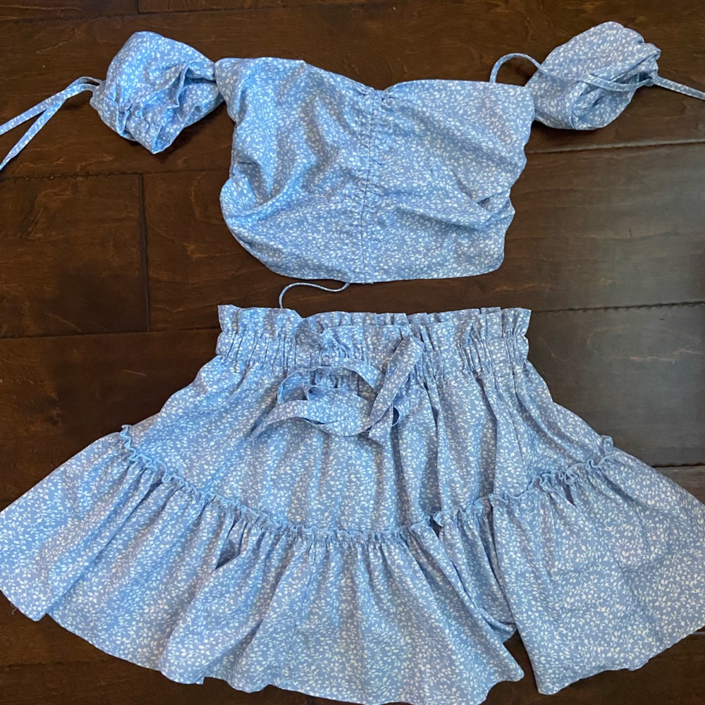 Blue skirt/top set; size medium.